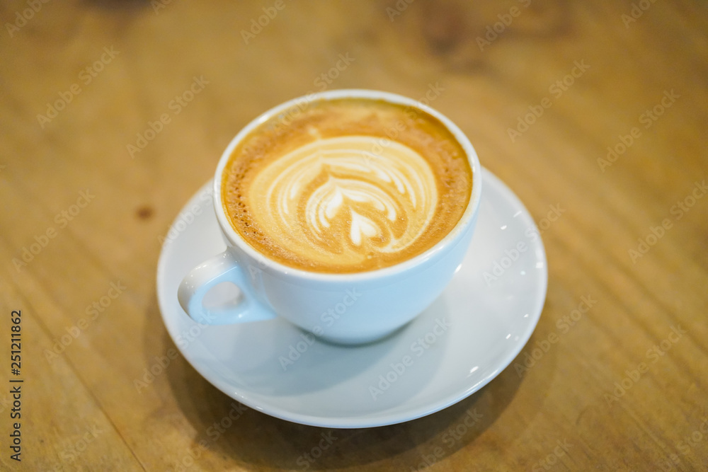 Cups of latte art on wooden table background, Top view. Cups of latte art on wooden table background, Top view.