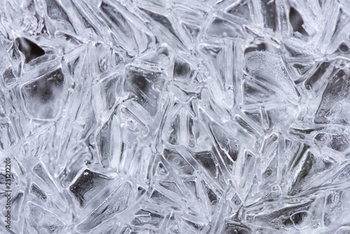 Ice crystals, close-up top view, background. Theme of winter and frost photo