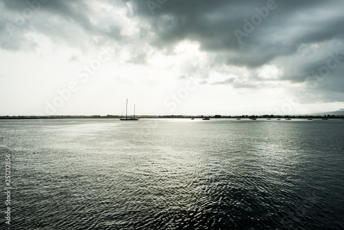 Dramatic view of the horizon on a rainy day from the tourist port of Ortigia in Syracuse.