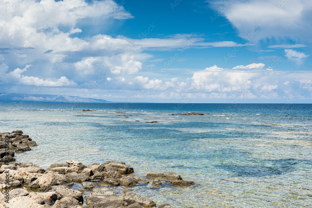 Panoramic view of a beautiful sea on a summer day. Useful for use as a backdrop for advertising in summer vacation resorts.