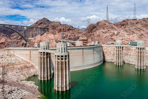 View of the Hoover Dam and Lake Mead,  in the Black Canyon of the Colorado River, on the border between the U.S. states of Nevada and Arizona.  photo