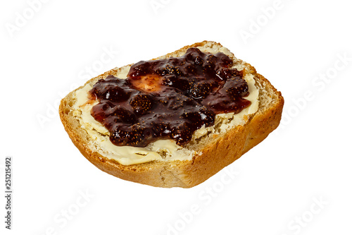 slice of white bread with butter and strawberry jam isolated