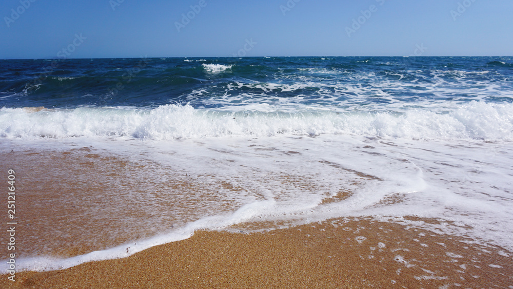 Tropical beach. Ocean wave background. Sand and blue sea. Ocean water nature, beach relax. Summer sea vacation Tropical beach. Ocean wave background. Sand and blue sea. Ocean water nature, beach relax. Summer sea vacation