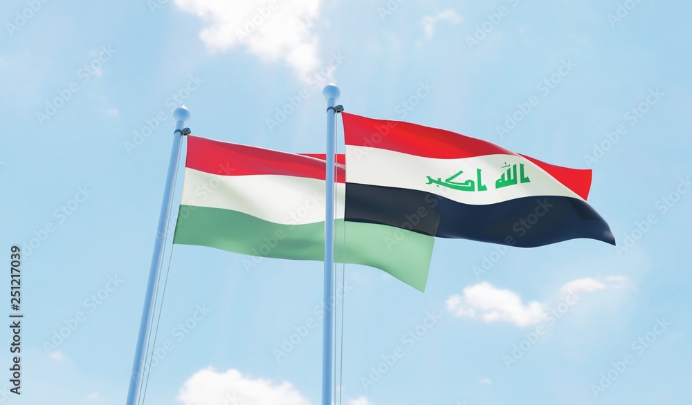 Iraq and Hungary, two flags waving against blue sky. 3d image Iraq and Hungary, two flags waving against blue sky. 3d image