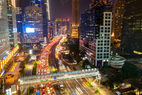 Jakarta downtown with traffic jam at night time