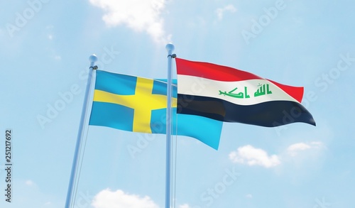 Iraq and Sweden, two flags waving against blue sky. 3d image