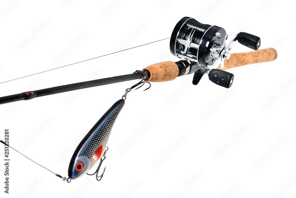 fishing rod, reel, wobbler, braided fishing line metal leash jerk, white  background, close-up Stock Photo