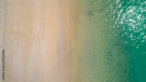 Aerial top view beautiful sea landscape, beach and wave with turquoise sea water with copy space