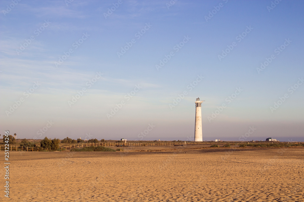Beach and lighthouse in Morro Jable, Fuerteventura, Spain