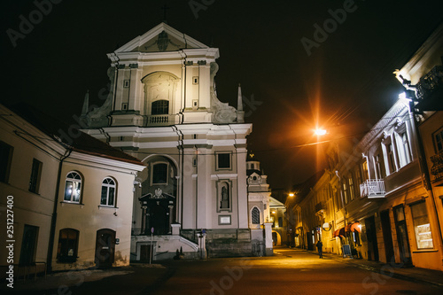 Vilnius, Lithuania: the Gate of Dawn st. Teresa church, one of its most important historical, cultural and religious monuments at night