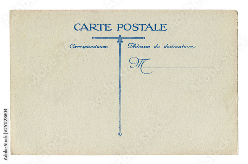 Back of historical French postcard: blank card with correspondence and address boxes on grey-brown old paper with blue lines, the beginning of the 20th century. France