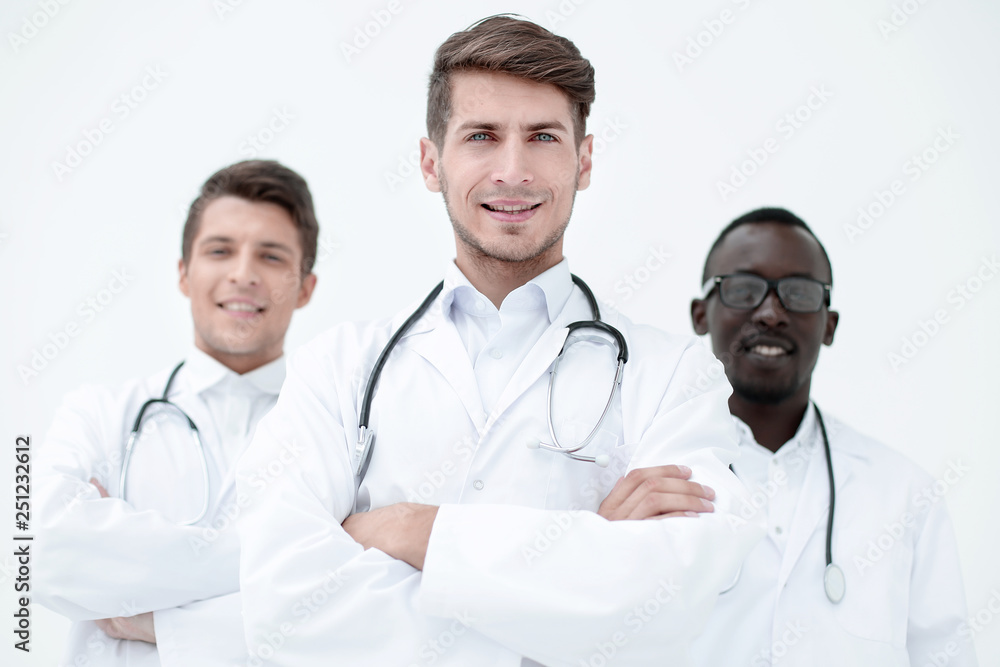 three confident doctors colleagues standing together three confident doctors colleagues standing together