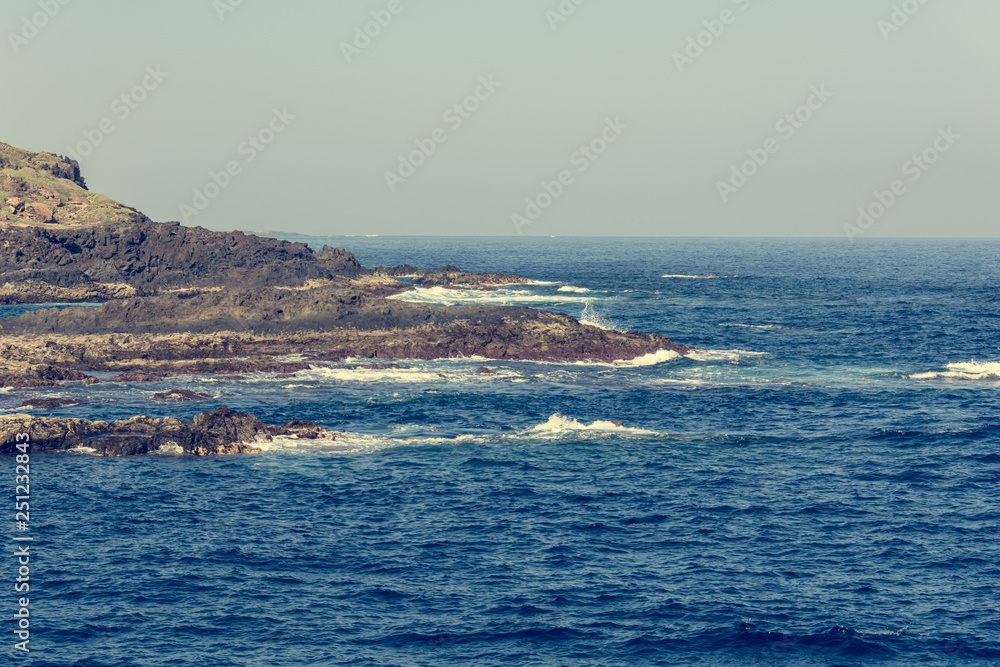 Spectacular vulcanic coastline shapped with lava forms. Spectacular vulcanic coastline shapped with lava forms.
