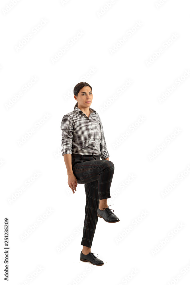 Young businesswoman isolated on white background doing exercises Young businesswoman isolated on white background doing exercises