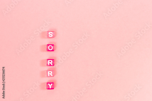 Картината върху платно sorry  inscription made of colorful cube beads with letters