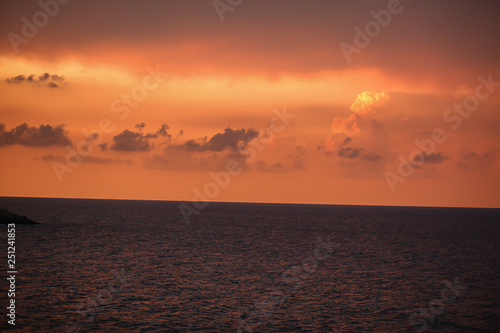 Fototapeta Naklejka Na Ścianę i Meble -  Fiery orange sunset over the sea