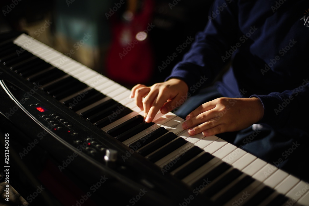 Hands playing on musical instrument | Student learn to play Electric piano