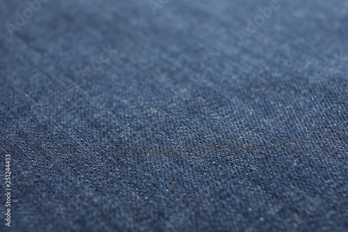 Texture of blue jeans as background, space for text © Atlas