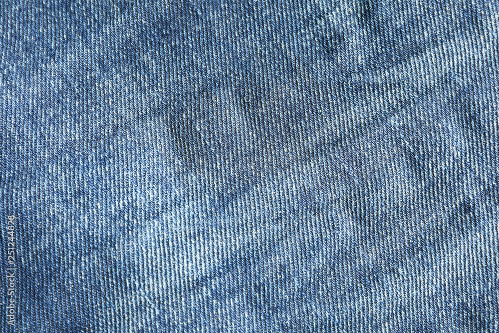 Texture of blue jeans as background, space for text Texture of blue jeans as background, space for text