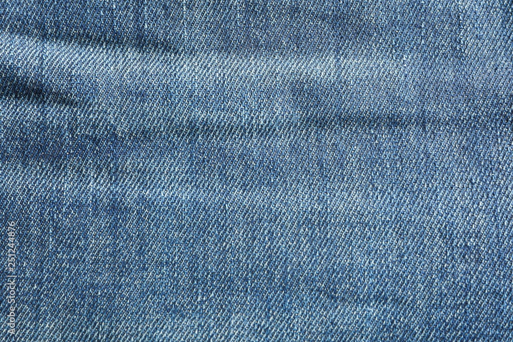 Texture of blue jeans as background, space for text Texture of blue jeans as background, space for text