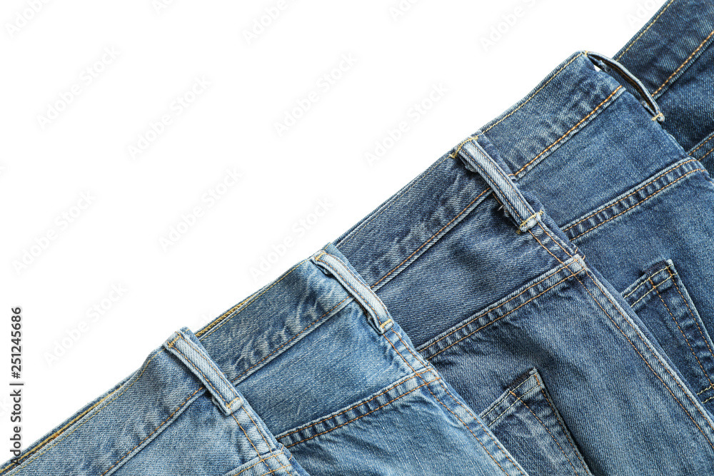Jeans of different colors isolated on white background, space for text Jeans of different colors isolated on white background, space for text