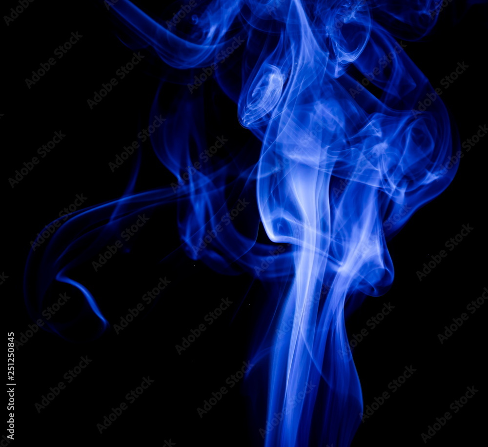 Obraz premium Blue smoke on black background