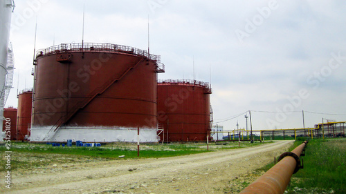 Tank the vertical steel. Capacities for storage of oil  products photo