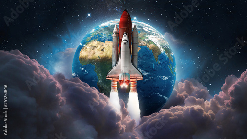 Fototapeta Naklejka Na Ścianę i Meble -  Space shuttle launch in the space. Earth and pink clouds on background. Space art wallpaper. Galaxy lights. Elements of this image furnished by NASA