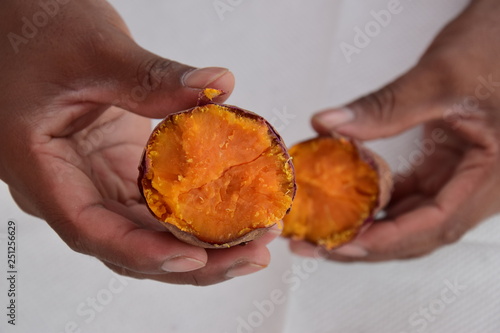 Orange sweet potato in half