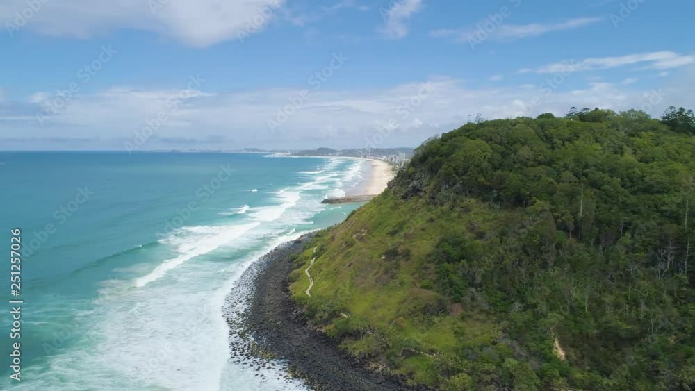 Aerial pan extending into the ocean over Gold Coast coastline near Burleigh Head National Park in Queensland, Australia Aerial pan extending into the ocean over Gold Coast coastline near Burleigh Head National Park in Queensland, Australia
