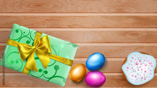 Realistic colored Easter eggs, tasty cake and beautiful gift box with bow on wooden planks