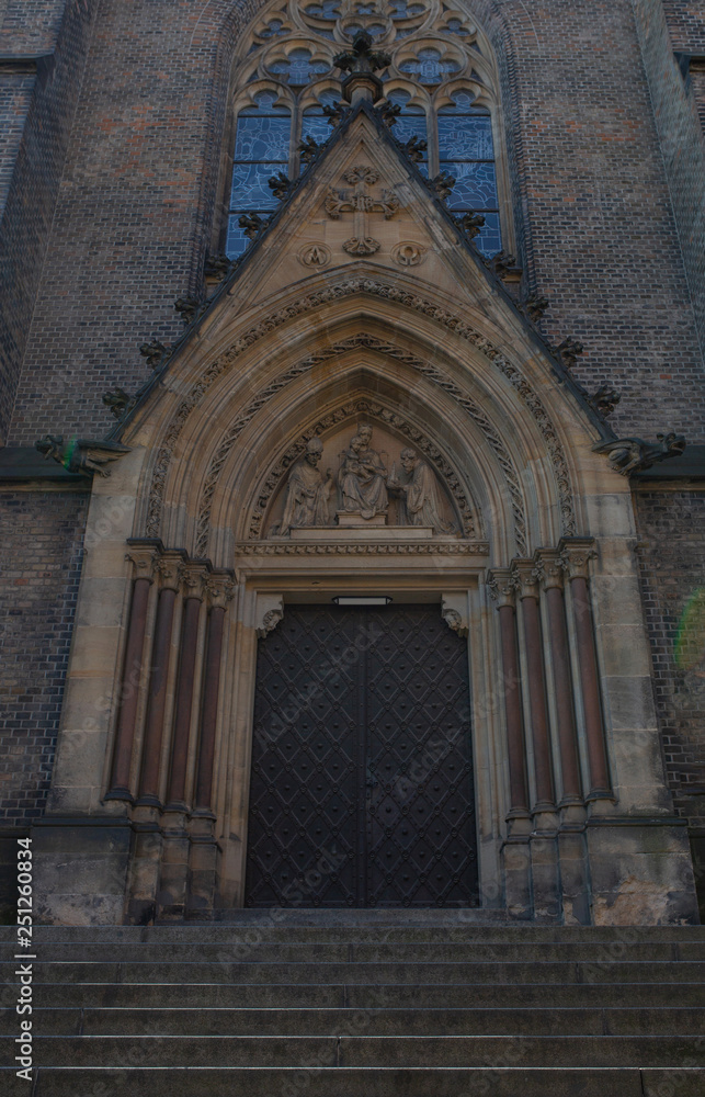 Faсade of gothic cathedral with beautiful door and window Faсade of gothic cathedral with beautiful door and window