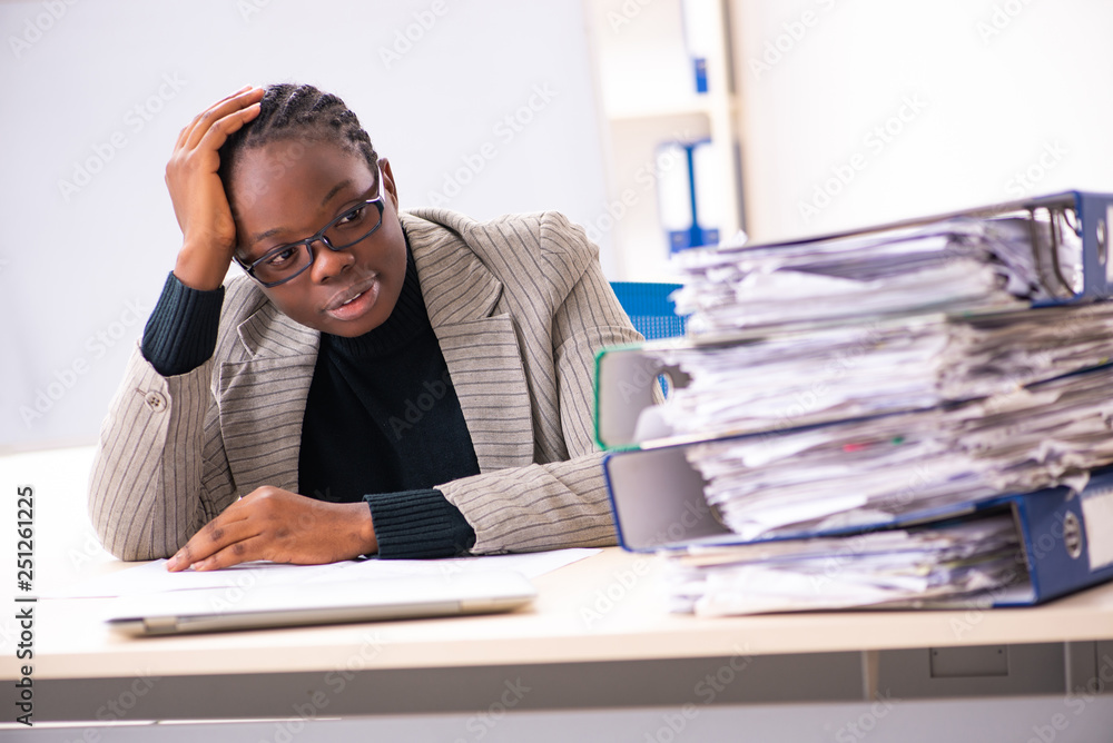 Black female employee unhappy with excessive work Black female employee unhappy with excessive work