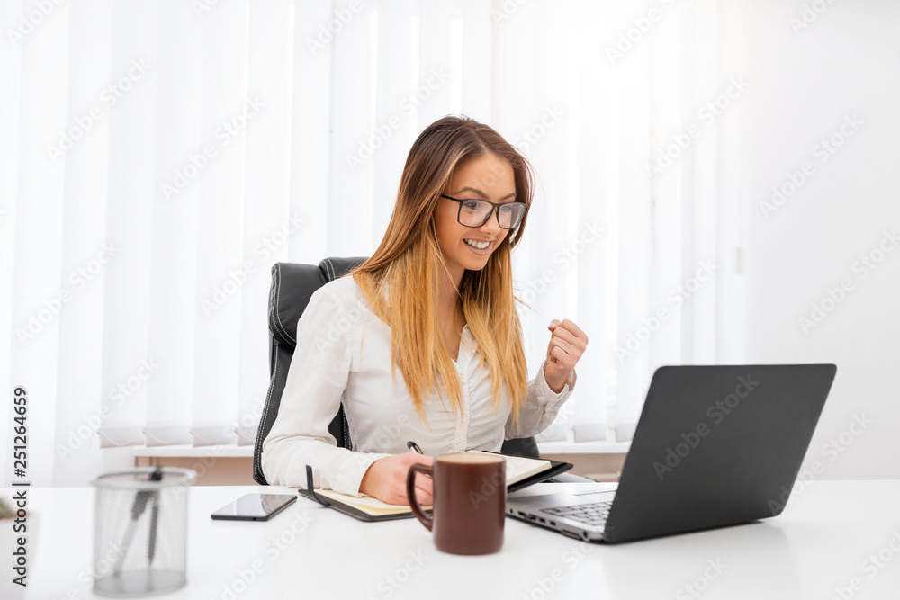 The beautiful young manager worked hard to achieve success on work. The beautiful young manager worked hard to achieve success on work.