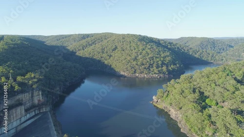 Slow rise above Lake Nepean and forested hills photo