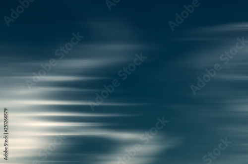 dark abstract image with white blurred lines