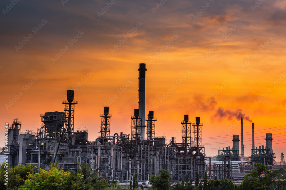 Fototapeta premium Landscape of Oil and Gas Refinery Manufacturing Plant., Petrochemical or Chemical Distillation Process Buildings., Factory of Power and Energy Industrial at Twilight Sunset., Engineering Petroleum.