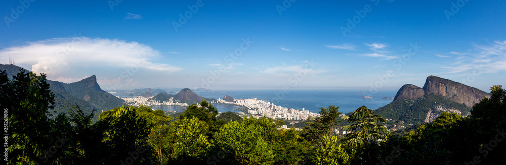 Beautiful PANORAMIC landscape with rainforest, city district (Leblon, Ipanema, Botafogo), Lagoon Rodrigo de Freitas and mountains (corcovado, sugarloaf, two brothers ) seen from Vista Chinesa in Tijuc