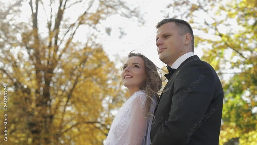 Wedding couple. Lovely groom and bride. Happy family. Man and woman in love. Wedding day. Slow motion Wedding couple. Lovely groom and bride. Happy family. Man and woman in love. Wedding day. Slow motion