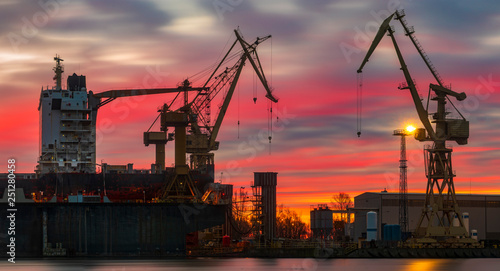 merchant ship in the dry dock of the repair yard