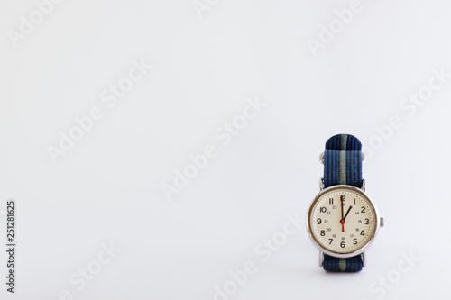 White wristwatch on a blank white background for slides or text or powerpoint