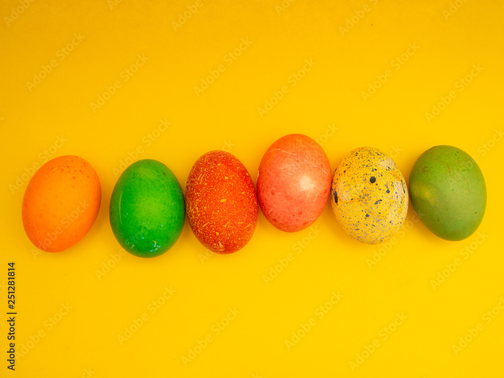 Colorful Easter Eggs On Yellow Background Colorful Easter Eggs On Yellow Background