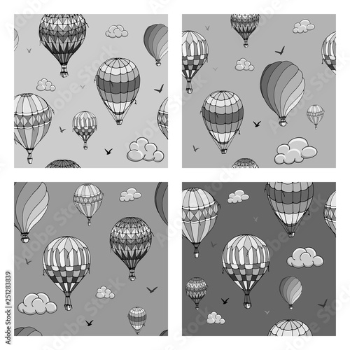 Set of vector seamless pattern with balloons in monochrome colors. Many differently colored striped air balloons flying in the clouded sky. Clouds and birds soaring in the sky. Travel and vacation.