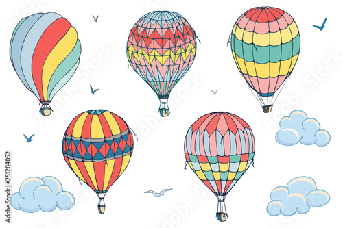 Vector isolated balloons on white background. Many differently colored striped air balloons flying in the clouded sky. Patterns of clouds and birds flying in the sky. Travel and vacation.
