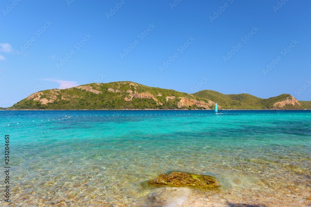 Beautiful seascape photo of island near Koh Kham Island with tropical clear turquoise sea water in gulf of Thailand