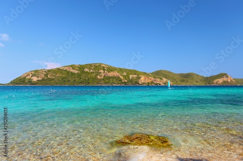 Beautiful seascape photo of island near Koh Kham Island with tropical clear turquoise sea water in gulf of Thailand © Pornprasert