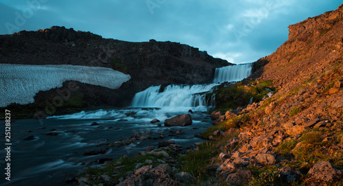 Waterfall Dynjandi in Iceland on sunset 