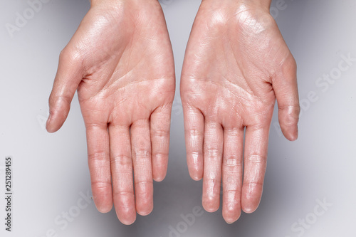glossy hand. wet hands.