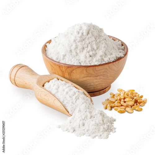 Bowl of white wheat flour and seeds isolated