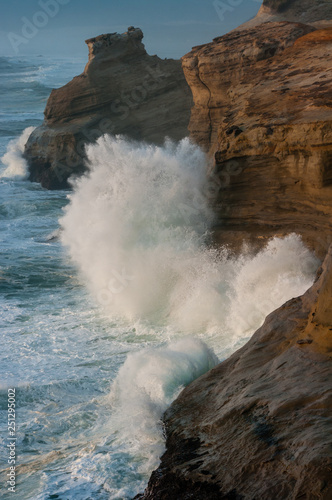 Waves crash at Cape Kiwanda, Oregon.